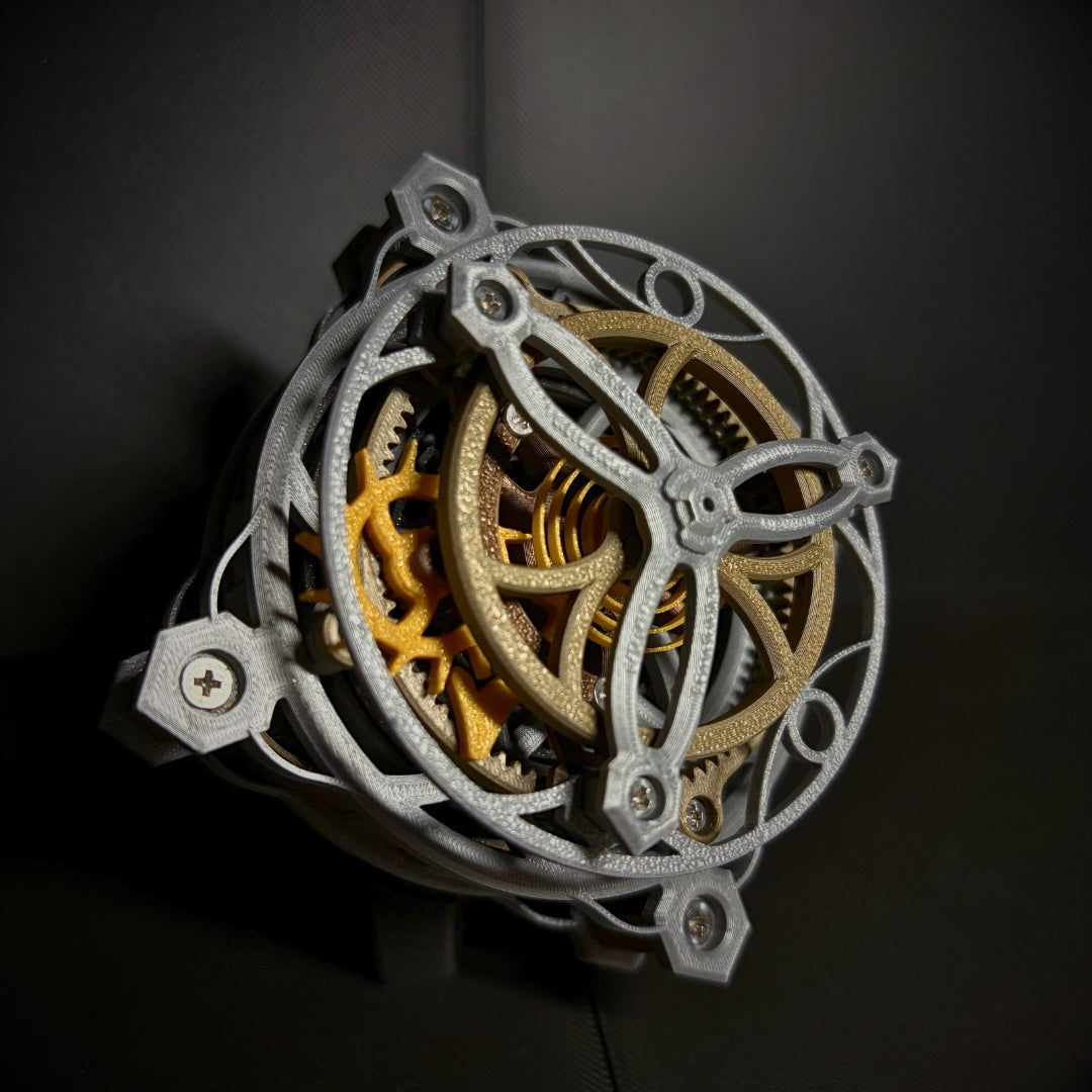 Mechanica Tourbillon in hand, showing its enlarged mechanical assembly